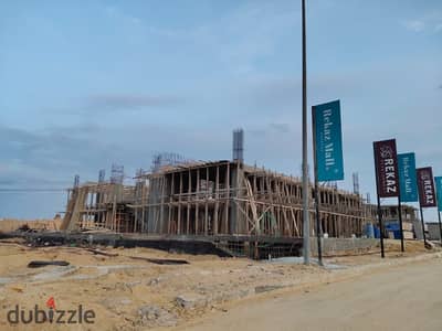 Investment Shop for Sale in REKAZ Mall El Shorouk 59 sqm Construction Started Gamal Abdel Nasser Axis Near Iskan El Mostakbal SODIC City Club Green Hi