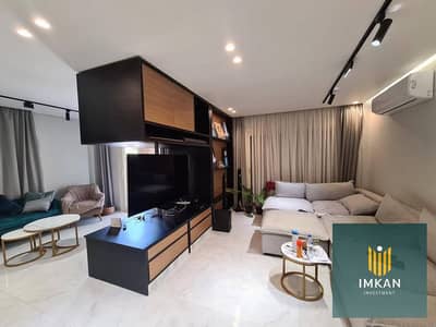 Apartment for sale in Al-Jar Compound, Sheraton, available with the longest installment plan; fully finished, including air conditioning and a kitchen