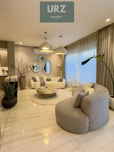 5 bedroom villa for sale with installments over 12 years double view, near AUC with Mountain View Aliva and Azar and the directly on the Suez Road.