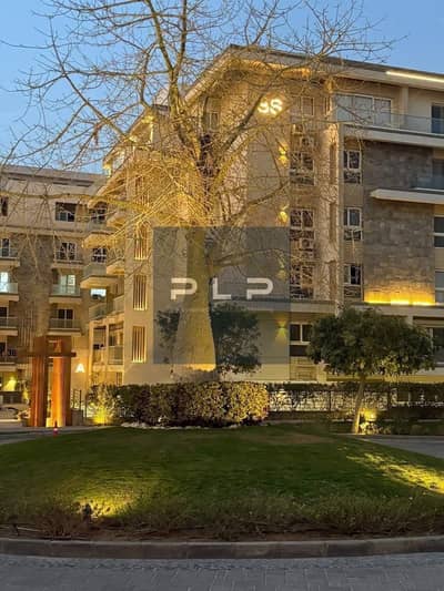 Ground-floor apartment with a garden for sale in Mountain View iCity; prime location with an open view and Ready to move.