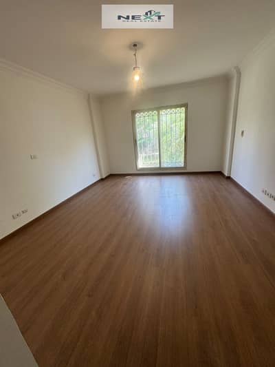 For rent in Madinaty, a new law ground floor apartment with a garden, 245 + 80 sq m, garden view, company finishing, close to services and the mosque,