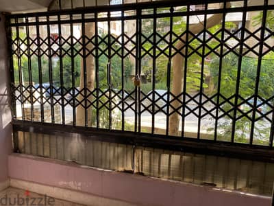 شقة مميزة للبيع ارضي مرتفع ناصيه عمارات البنوك الحي ١١ - ٦اكتوبر