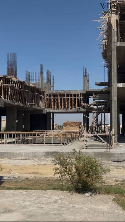 15 sqm commercial shop for sale in Sheikh Zayed directly on Dahshour Link with 40 percent construction completion