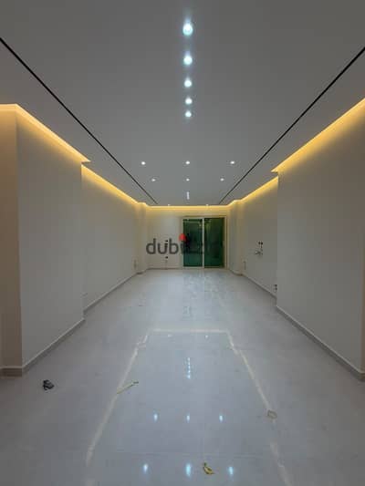 First-occupancy" apartment for rent in Al-Maryoutiya (Haram area); located in a hotel-style tower with ultra-modern finishing.