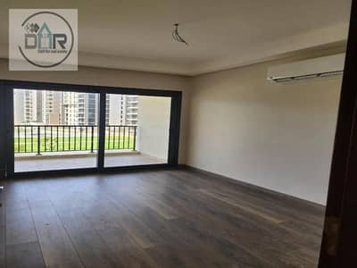 Apartment for rent in Zed Towers, Sheikh Zayed—featuring a distinctive view, including kitchen and air conditioning; first-time occupancy.