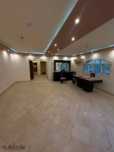 Ground floor apartment with 165m + 130m garden in Beverly Hills Zayed. 2 beds, 2 baths, includes ACs & kitchen. Price: 8M EGP.