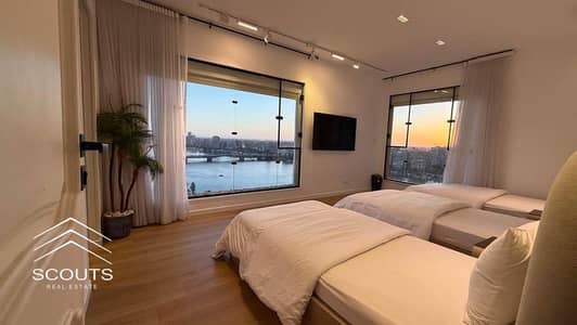 High ROI in USD | Nile-Front Apartment for Sale in Reve Du Nil Maadi Fully Furnished High-End Finishing with Appliances & Central AC