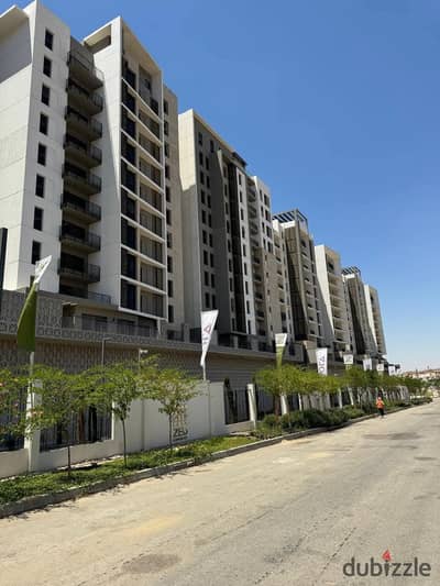 Apartment for sale in ZED Compound, Sheikh Zayed; finished, including air conditioning and kitchen.