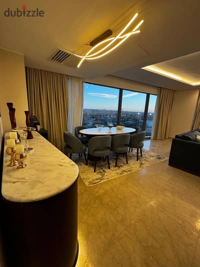 Furnished hotel-style apartment for rent in ZED Towers, Sheikh Zayed – 220 sqm – First-time occupancy – 3 bedrooms – 7th floor – Unobstructed panorami