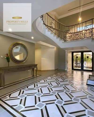 Villa for sale in front of Gate 5 Madinaty, ready for immediate delivery, with interest-free installments