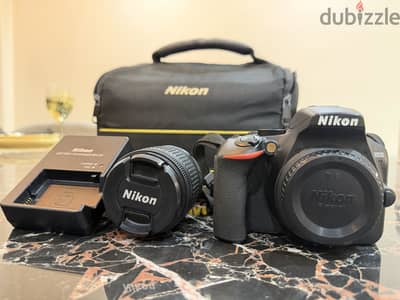 Nikon D3500 + 18-55mm Kit (شاتر 10k) | كاميرا نيكون بحالة الزيرو