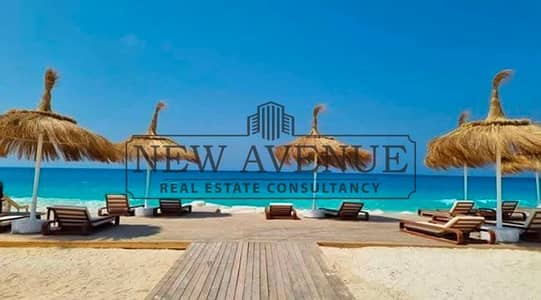 تاون هاوس ميدل للبيع في Playa Ghazala North Coast بلايا غزالة الساحل الشمالي مطله مباشرة على اللاجون وواجهة شمالية