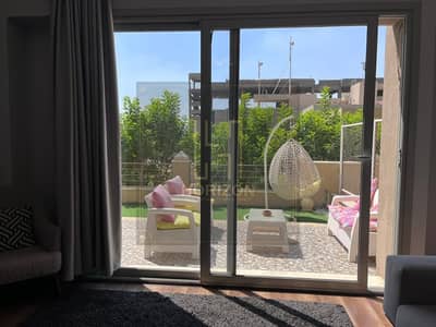 furnished Studio with garden for rent in Compound Village Gate Palm Hills New Cairo