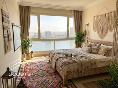 اخر شقه فيو علي النيل فندق ريف دو نيل مفروشه بالاجهزه و التكييفات بجوار فندق Hilton مباشر ومستشفي السلام دقايق من الزمالك نوفارا -  Reve Du Nil