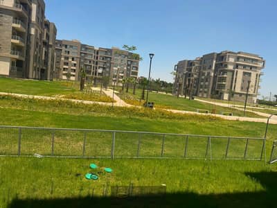 ِApartment for sale, 130m with 162m private garden fully finished in Jannah Zayed 4 right next to Village West Sheikh Zayed