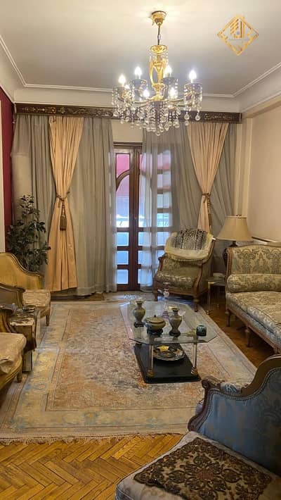 160m² apartment for sale in Dokki, Mosaddaq Street; high-end finishing, front-facing, with a balcony.
