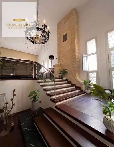 Villa for the price of an apartment, 4BR, 12-year installments, landscape view in Sarai New Cairo