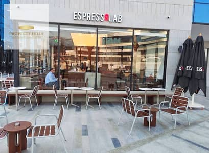 Ground floor shop with immediate occupancy, generating a monthly return of 250,000, located on North 90th Street in New Cairo.