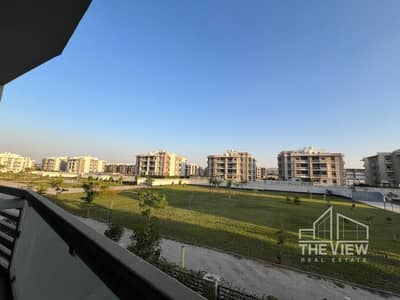 Distinctive apartment for sale with a landscape view—Phase 4, Khamayel Compound, Sheikh Zayed—immediate delivery.