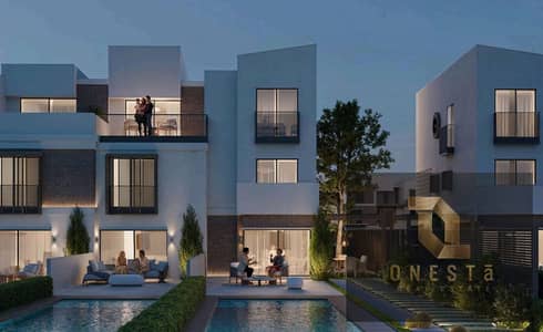 Twin house villa for sale with a 35% discount in Scenes Compound, Mostakbal City. It features a prime location and view, a north-facing. up to 10 years