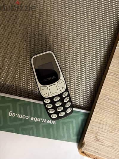 Nokia mini موبيل عفرتو اصغر موبيل ممكن تشوفة معاه ٣ بطارية