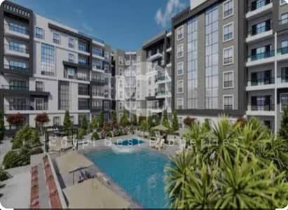 An apartment in Al Karma Kay, Sheikh Zayed, fully finished, with an 8-year installment plan and delivery within one year.