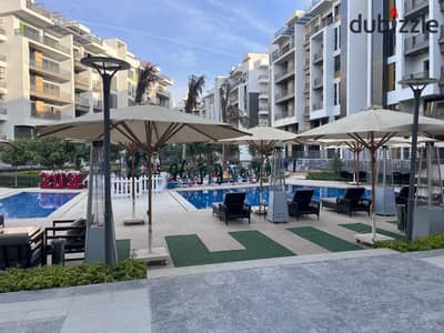 Apartment for rent in The Icon Residence compound; includes a kitchen equipped with appliances and air conditioning; 200 square meters.