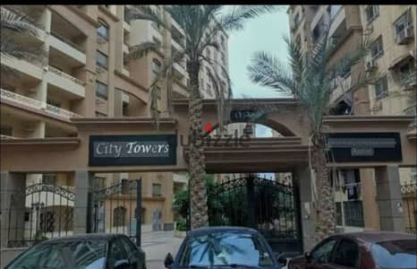 شقة للبيع في كمبوند سيتي تاور، حي الواحة مدينة نصر، 158 متر، 3 غرف، 2 حمام، الدور الرابع، تشطيب عالي، فيو حديقة، جاهزة للسكن فورًا.