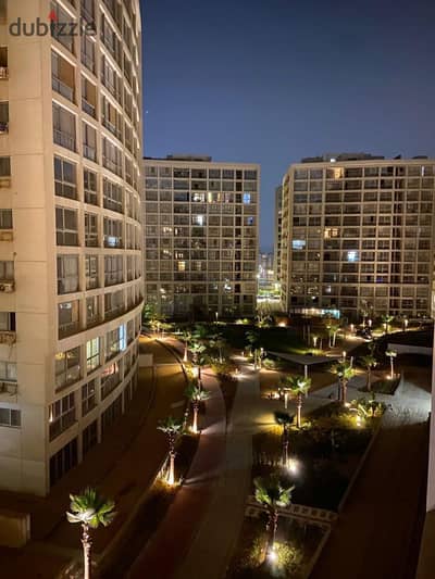 Apartment for sale in Compound One Qatamiya, 155 meters, semi-finished, with garage, open view of the administrative towers, and excellent interior division.