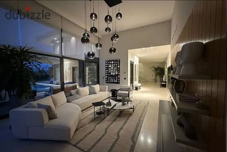 Fully Finished Ground-Floor Two-Bedroom Apartment with Garden for Sale in Swan Lake West, October, by Hassan Allam.