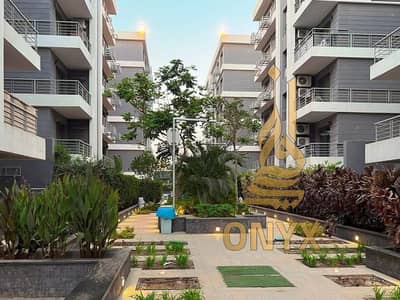 A two-bedroom apartment at a fantastic price in the Taj City compound, located directly on the Suez Road—opposite Cairo International Airport and next