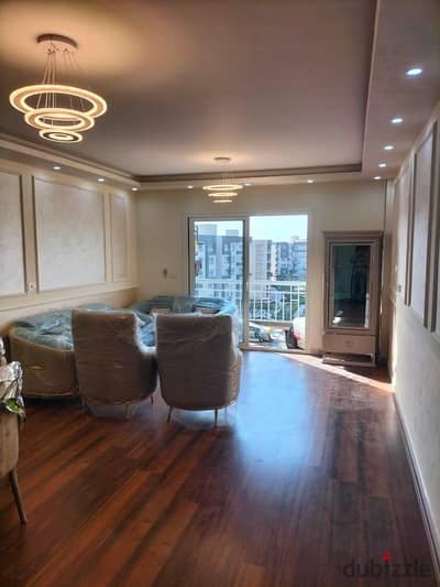 Furnished apartment for rent, 116 sqm, first occupancy, with custom finishes and hotel-style furnishings, located on the fifth floor in B12, Madinaty.
