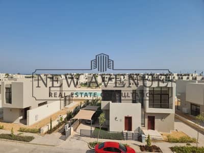Fully Finished with Kitchen and ACs Corner Townhouse villa with garden for sale in Azha Al Sokhna with prime location Second Row Lagoon Ready to move