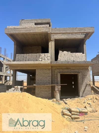 Twin house for sale, 291 sqm, in V-Town Compound, with a 9-year installment plan; located on the Cairo-Alexandria Desert Road.