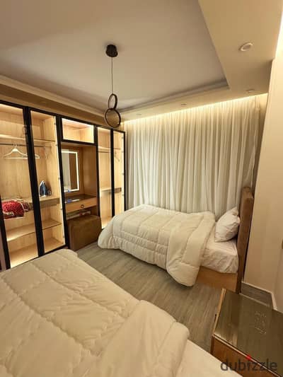 Furnished apartment in Compound One Katameya, three rooms, 2 bathrooms, and a circular kitchen in Maadi directly. The compound is located in a distinguished area, with swimming pools available, as well as large green areas. There is a playground specifically for children, and also a Starbucks. All services are available, and the compound is surrounded by the...