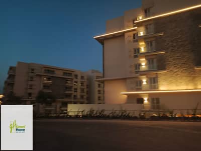 Under market price Apartment with garden For Sale in Mountain view iCity New Cairo  Ready to move  Price Including parking and maintenance