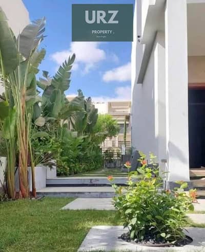 4-bedroom villa on the lagoon with complete privacy and a private pool for sale in New Cairo near Sodic the Middle Ring Road Stone Park and Palm Hills