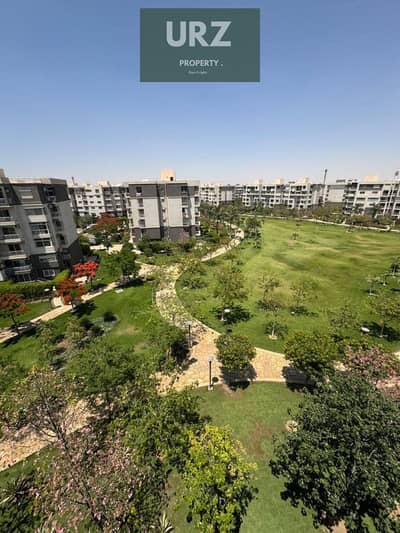 Apartment for sale open view on Central Park directly next to Madinaty and directly on the Suez Road minutes from the Fifth Settlement