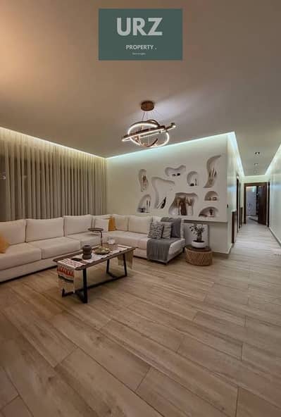 Apartment for sale with the lowest down payment in Market Direct on the Suez Road and opposite Cairo Airport, near Al Rehab Taj City Compound