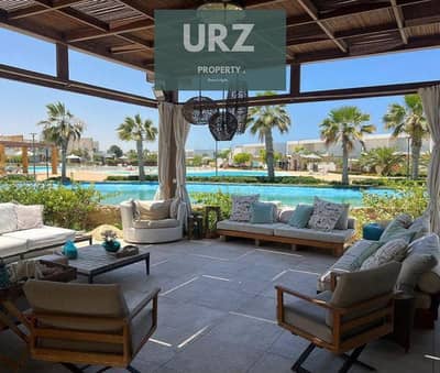 علي خليج راس الحكمة لاول مرة فيلا luxury صف اول علي البحر علي Natural lagoon في مدن الساحل الشمالي بالقرب مراسي  وسول ومرسي بغوش والماظة باي للبيع