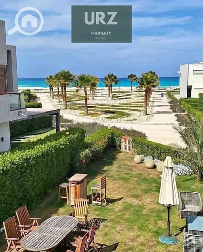 2-Bedroom ground-floor chalet with private garden first-row sea & lagoon view 9year installments fully finished with ACs Ras El Hekma near Seash