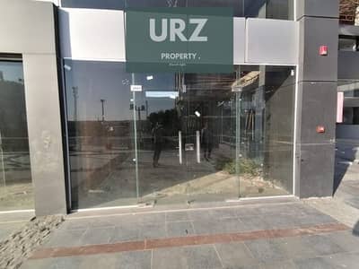 Shop for sale on Suez Road next to Madinaty in Sarai with 15 year installments in a major commercial hub near Shorouk and The Spine