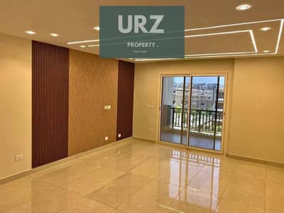 Apartment for sale in Sarai 12 years installments and 50% discount located on Center Park on Suez Road next to Madinaty near AUC