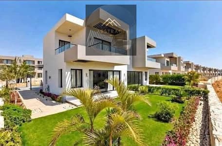 For 100K, first-row Lagoon villa steps from the sea, finished with kitchen and ACs in Azha Sokhna, in the most distinguished land in Ain Sokhna, next