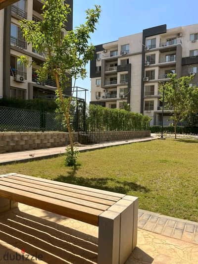 For rent, a 130-meter apartment on the ground floor with a distinctive view in Janah Compound, 6th of October