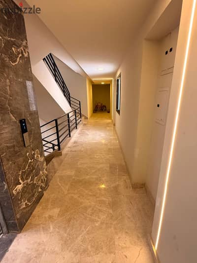 Fully finished, including air conditioning and a kitchen; located in a prime spot in El Shorouk, with a north-facing orientation and a double view, su