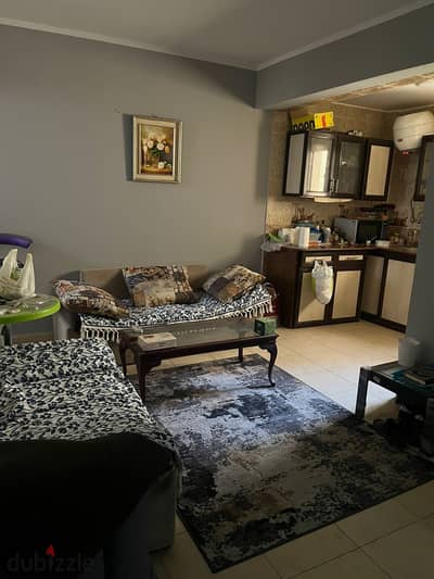 Apartment for sale in Rawdat Al-Mohandessin, Seventh District, Sheikh Zayed with a private garden