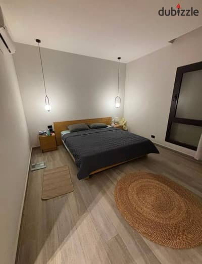 Furnished apartment for rent in Courtyard Sodic, Beverly Hills, Sheikh Zayed, with a landscape view.
