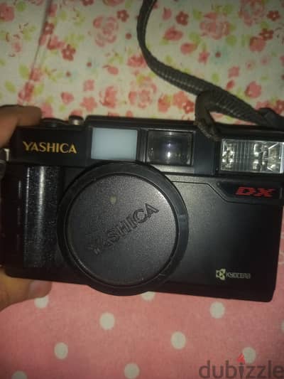 كاميرتين فيلم قدام: Yashica DX Minolta Riva 35ST QD الحالة الخارجية ظا