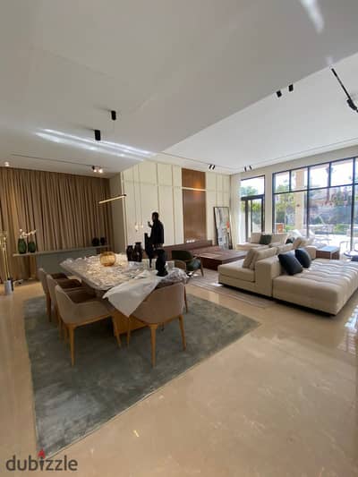 Apartment for sale in O West by Orascom, featuring a prime location overlooking the landscape. The compound is fully inhabited and offers all amenitie